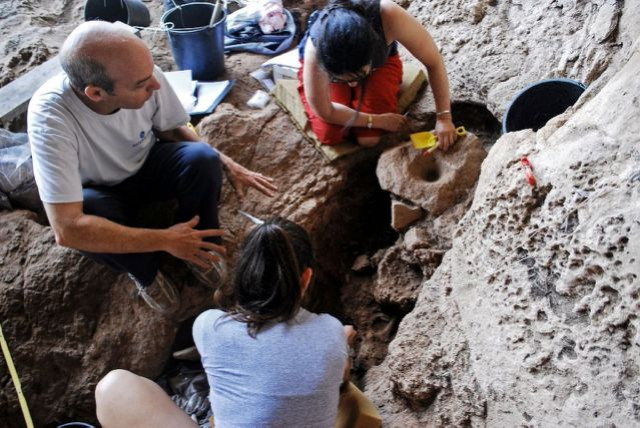 archaeologists inspect what they believe is the world 039 s oldest site for alcohol production south of the israeli city of haifa in cave dating back 13 000 years photo afp archaeologists inspect what they believe is the world 039 s oldest site for alcohol production south of the israeli city of haifa in cave dating back 13 000 years photo afp