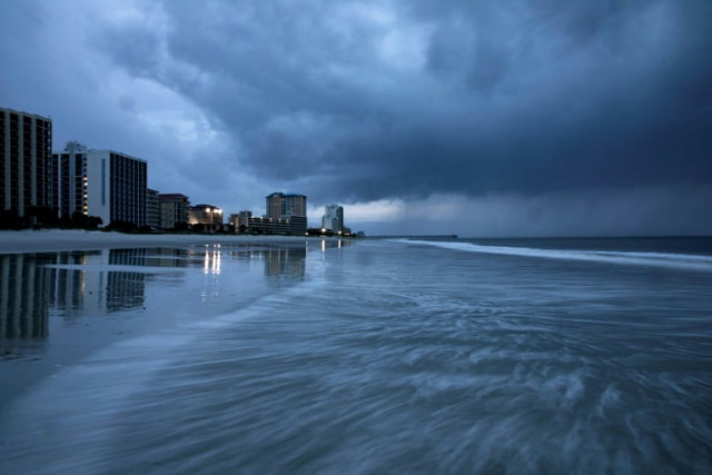 rain begins to fall as the outer bands of hurricane florence make landfall in myrtle beach south carolina photo afp rain begins to fall as the outer bands of hurricane florence make landfall in myrtle beach south carolina photo afp