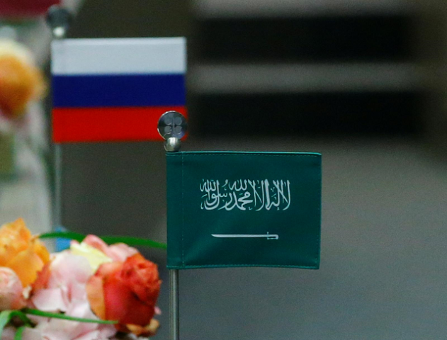 the national flags of russia and saudi arabia are seen during a meeting of the organization of the petroleum exporting countries opec and non opec producing countries in vienna austria may 25 2017 photo reuters the national flags of russia and saudi arabia are seen during a meeting of the organization of the petroleum exporting countries opec and non opec producing countries in vienna austria may 25 2017 photo reuters