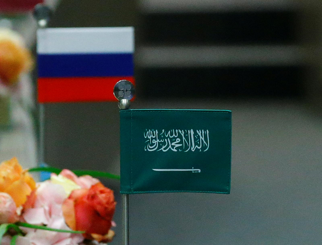 the national flags of russia and saudi arabia are seen during a meeting of the organization of the petroleum exporting countries opec and non opec producing countries in vienna austria may 25 2017 photo reuters