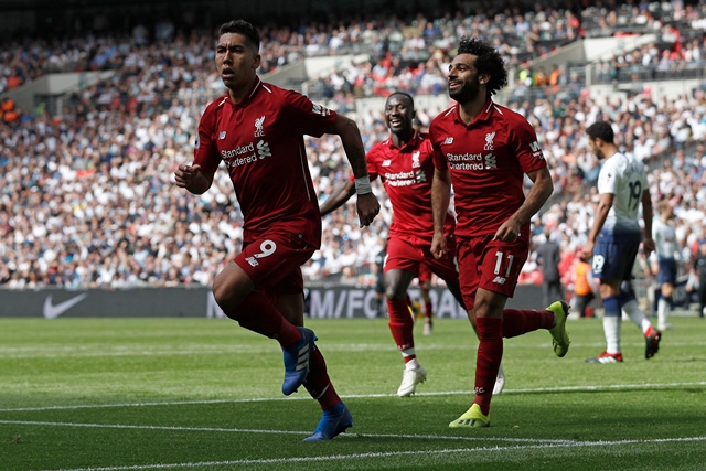 liverpool 039 s brazilian midfielder roberto firmino l celebrates after scoring their second goal with liverpool 039 s egyptian midfielder mohamed salah and liverpool 039 s guinean midfielder naby keita against tottenham hotspur photo afp