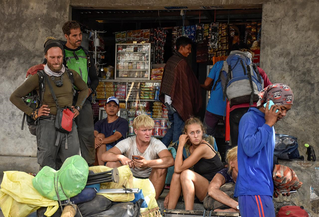 indonesian and foreign climbers are seen after walking down from rinjani mountain at sembalun village in lombok timur indonesia july 29 2018 photo reuters indonesian and foreign climbers are seen after walking down from rinjani mountain at sembalun village in lombok timur indonesia july 29 2018 photo reuters