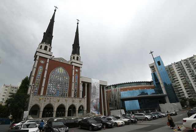 in the name of the father unholy row over seoul church inheritance