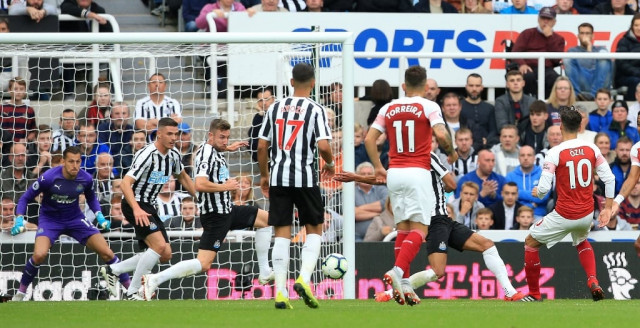back in form ozil scored his first premier league goal since december to help arsenal beat newcastle 2 1 photo afp back in form ozil scored his first premier league goal since december to help arsenal beat newcastle 2 1 photo afp