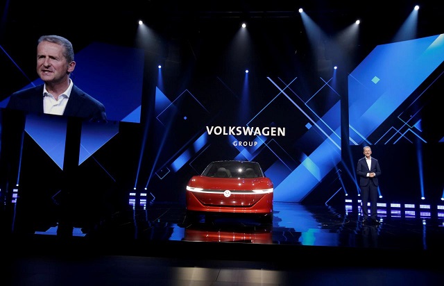 herbert diess volkswagen 039 s new ceo speaks next to a volkswagen id concept car at a media event ahead of the beijing auto show in beijing china april 24 2018 photo reuters