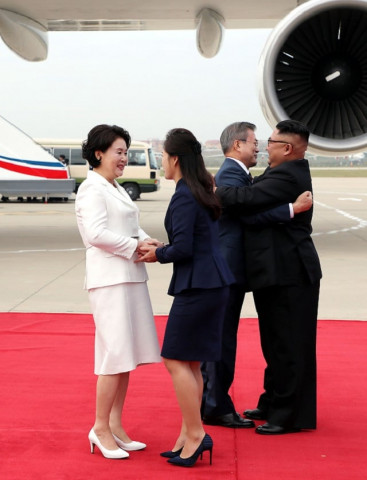 north korean leader kim jong un and his wife ri sol ju greet south korean president moon jae in and first lady kim jung sook at pyongyang sunan international airport north korea ahead of the third summit with north korean leader kim jong un in this still frame taken from video september 18 2018 photo reuters north korean leader kim jong un and his wife ri sol ju greet south korean president moon jae in and first lady kim jung sook at pyongyang sunan international airport north korea ahead of the third summit with north korean leader kim jong un in this still frame taken from video september 18 2018 photo reuters