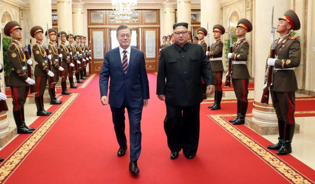 south korean president moon jae in is greeted by north korean leader kim jong un as he arrives at the headquarters of the central committee of the workers 039 party of korea for their meeting in pyongyang north korea september 18 2018 photo reuters south korean president moon jae in is greeted by north korean leader kim jong un as he arrives at the headquarters of the central committee of the workers 039 party of korea for their meeting in pyongyang north korea september 18 2018 photo reuters