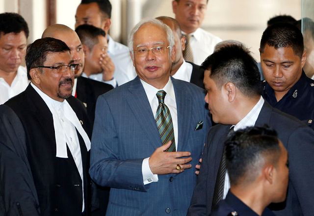 malaysia 039 s former prime minister najib razak walks out of a courtroom in kuala lumpur malaysia august 8 2018 photo reuters malaysia 039 s former prime minister najib razak walks out of a courtroom in kuala lumpur malaysia august 8 2018 photo reuters