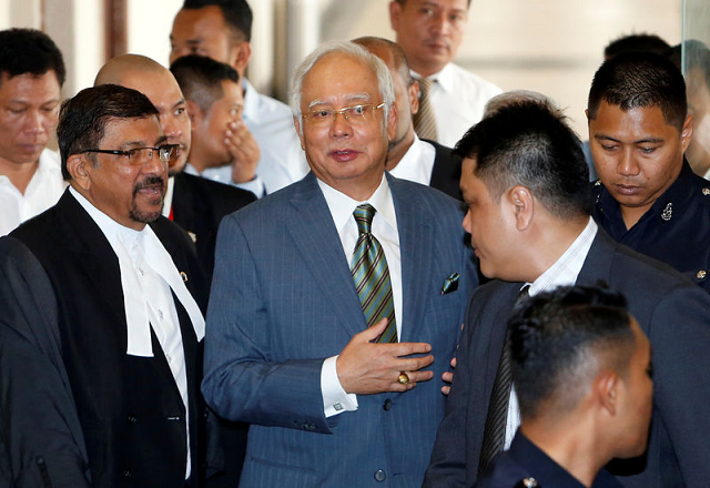 malaysia 039 s former prime minister najib razak walks out of a courtroom in kuala lumpur malaysia august 8 2018 photo reuters