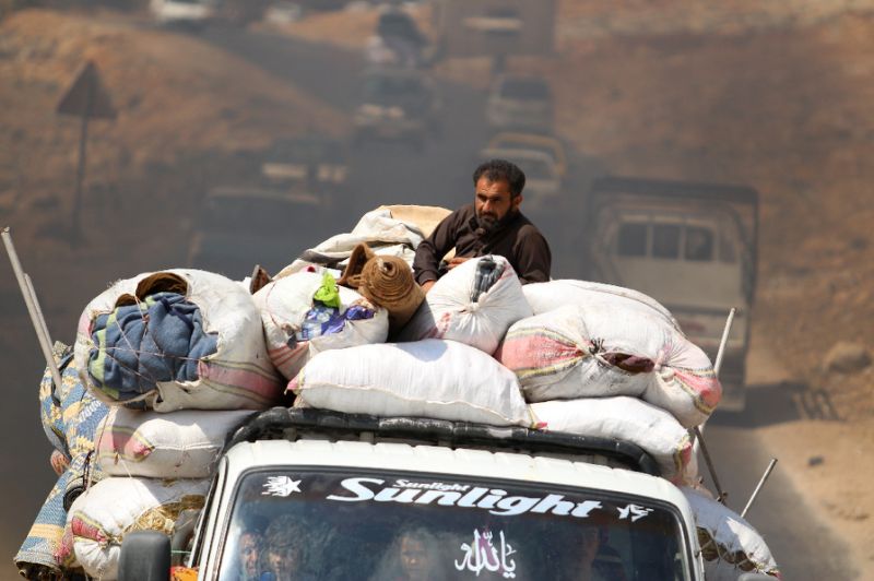 thousands of civilians who fled a threatened government offensive on syria 039 s last major rebel bastion idlib have headed home photo afp