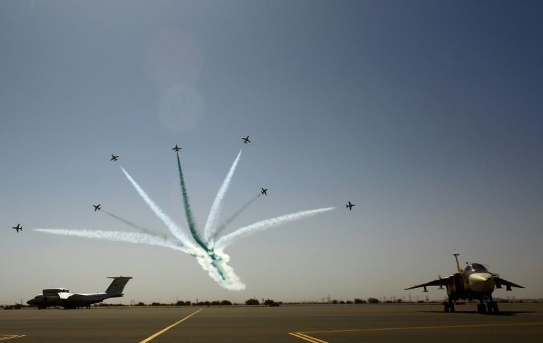 planes take part in a flyover during a joint sudanese saudi air force drill at the marwa air base around 350 kilometres north of khartoum photo afp