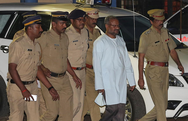 bishop franco mulakkal accused of raping a nun is escorted by police outside a crime branch office on the outskirts of kochi photo reuters