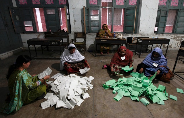 polling staff counting votes photo reuters