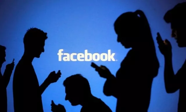 people are silhouetted as they pose with mobile devices in front of a screen projected with a facebook logo in this picture illustration taken in zenica october 29 2014 photo reuters people are silhouetted as they pose with mobile devices in front of a screen projected with a facebook logo in this picture illustration taken in zenica october 29 2014 photo reuters