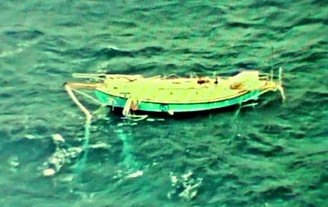 the capsized yacht thuriya of solo sailor abhilash tomy is pictured at sea in this september 24 2018 photo reuters the capsized yacht thuriya of solo sailor abhilash tomy is pictured at sea in this september 24 2018 photo reuters