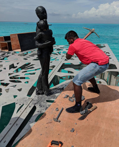 the resort highlighted that only the human forms of the sculpture were removed with the coralarium s metal cage still intact photo courtesy global construction review maldives police the resort highlighted that only the human forms of the sculpture were removed with the coralarium s metal cage still intact photo courtesy global construction review maldives police