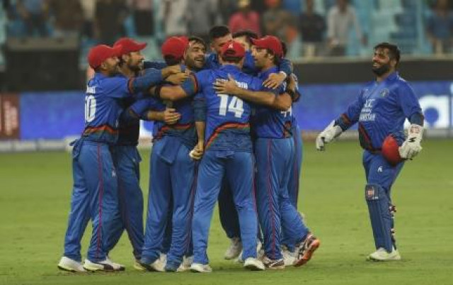 afghan cricketer rashid khan c captain asghar afghan 2r celebrates with teammate after match tied during the odi asia cup cricket match between afghanistan and india at the dubai international cricket stadium in dubai photo afp afghan cricketer rashid khan c captain asghar afghan 2r celebrates with teammate after match tied during the odi asia cup cricket match between afghanistan and india at the dubai international cricket stadium in dubai photo afp