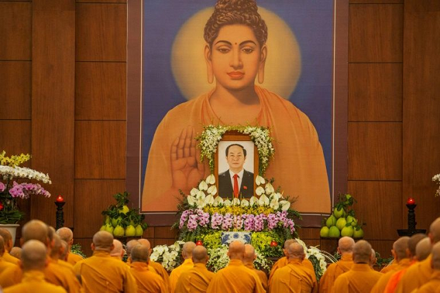 buddhist monks at a prayer ceremony for the late vietnamese president tran dai quang photo afp buddhist monks at a prayer ceremony for the late vietnamese president tran dai quang photo afp