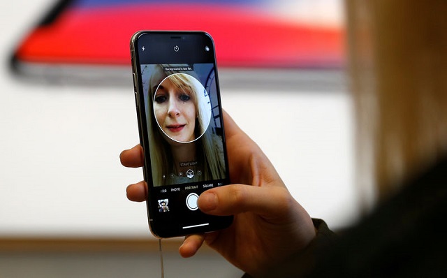 a customer uses the new face recognition software on the new iphone x inside the apple store in regents street in london britain november 3 2017 photo reuters