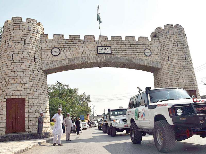 a view of jeeps lined up at the starting point of a jeep rally from bab e khyber to swabi to celebrate world tourism day week organised by k p tourism corporation photo app