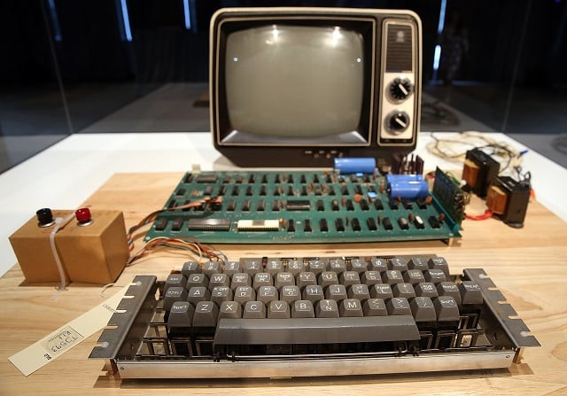 an apple 1 computer built in 1976 is displayed during the first bytes iconic technology from the twentieth century an online auction featuring vintage tech products at the computer history museum in mountain view california photo afp an apple 1 computer built in 1976 is displayed during the first bytes iconic technology from the twentieth century an online auction featuring vintage tech products at the computer history museum in mountain view california photo afp