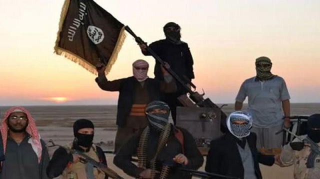islamic state militants pose with the group 039 s flag photo afp islamic state militants pose with the group 039 s flag photo afp