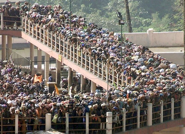 hindu pilgrims queue outside the sabarimala temple to offer prayers photo reuters