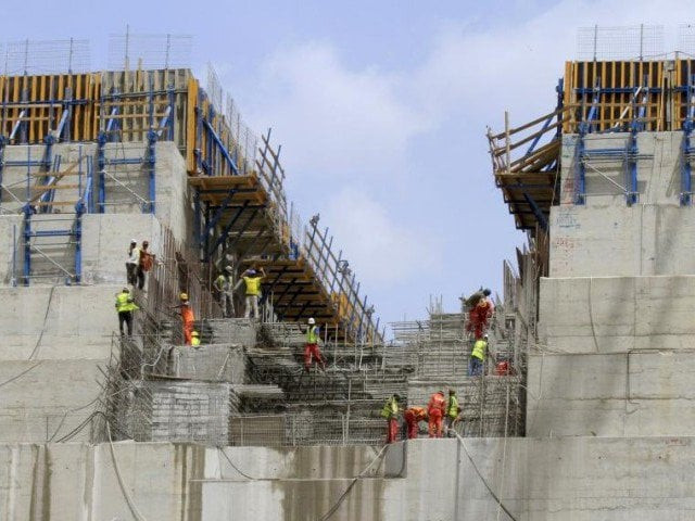 representational image of workers at dam construction site photo reuters representational image of workers at dam construction site photo reuters