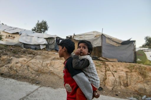 children are among those packed into the moria migrant camp on the greek island of lesbos photo afp