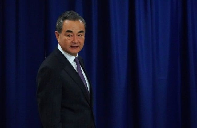 chinese foreign minister wang yi flatly denied american claims that china is stealing technology from us and other foreign businesses photo afp chinese foreign minister wang yi flatly denied american claims that china is stealing technology from us and other foreign businesses photo afp