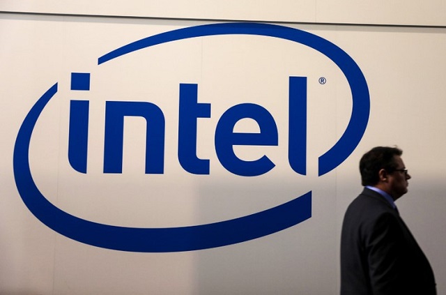 a visitor passes an intel logo at the mobile world congress in barcelona spain february 26 2018 photo reuters