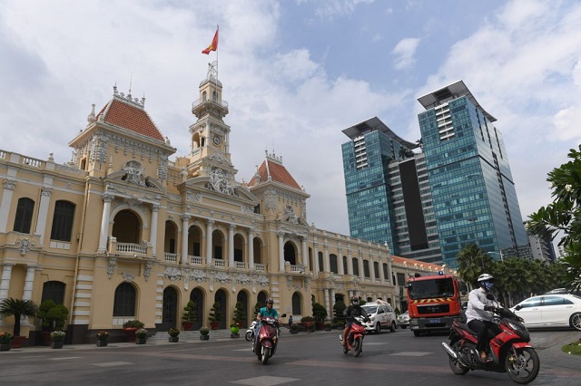 a french colonial era building next to a new shopping mall in ho chi minh city there are concerns that the demolition of famed french architectural gems in vietnam s biggest city will render it indistinguishable from other asian megalopolis photo afp