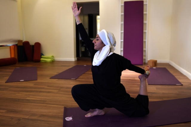 a saudi woman practices yoga at a studio in the western saudi arabian city of jeddah photo afp a saudi woman practices yoga at a studio in the western saudi arabian city of jeddah photo afp