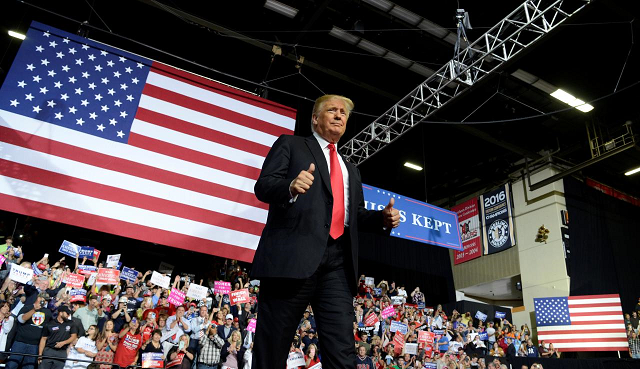 president donald trump gives a thumbs up to supporters as he arrives at wesbanco arena during a make america great again rally in wheeling west virginia us september 29 2018 photo reuters