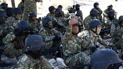 first militant group begins withdrawal from demilitarised zone in syria s idlib