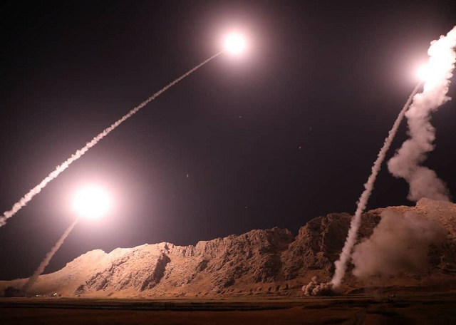 this handout photo provided by iran 039 s revolutionary guard official website shows missiles being launched from an undisclosed location to target militants in eastern syria early on october 1 2018 photo afp