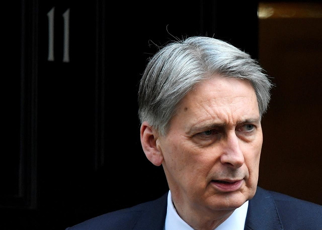 chancellor of the exchequer philip hammond leaves 11 downing street in london march 14 2018 photo reuters