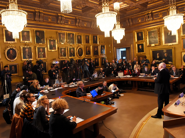 the nobel prize laureates for physics 2018 arthur ashkin of the united states gerard mourou of france and donna strickland of canada are announced at the royal swedish academy of sciences in stockholm photo afp