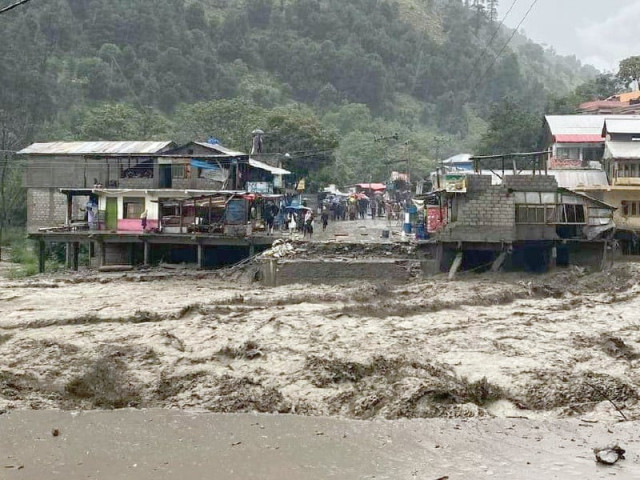 flash flood inundates mahabdri bazaar and munawar nullah damaging stores and goods in balakot travelers wait on kaghan highway after its closure by a landslide photos zulfiqar ali express flash flood inundates mahabdri bazaar and munawar nullah damaging stores and goods in balakot travelers wait on kaghan highway after its closure by a landslide photos zulfiqar ali express