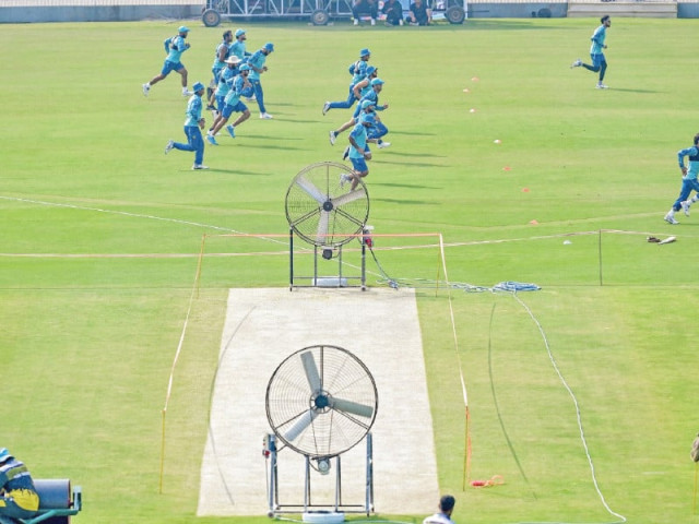 pakistan players warm up during a practice session ahead of their third test against england at the rawalpindi cricket stadium on monday photo afp pakistan players warm up during a practice session ahead of their third test against england at the rawalpindi cricket stadium on monday photo afp