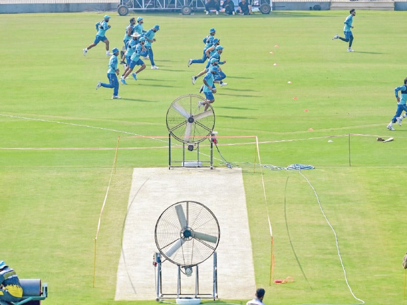 pakistan players warm up during a practice session ahead of their third test against england at the rawalpindi cricket stadium on monday photo afp