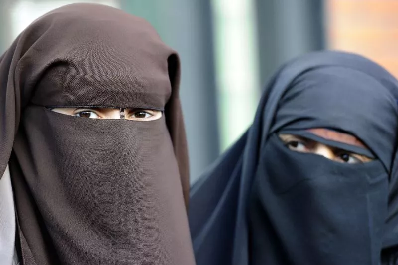 file photo of burqa clad women photo afp file photo of burqa clad women photo afp
