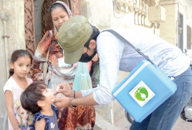a health worker administers anti polio drops to a child during the launch of the citywide vaccination campaign marking another crucial step in the fight to protect future generations from the crippling disease photo file jalal qureshi express