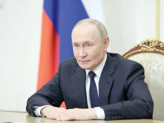 russia s president vladimir putin addresses the participants of the final stage of the 5th international financial security olympics via video link in moscow photo afp