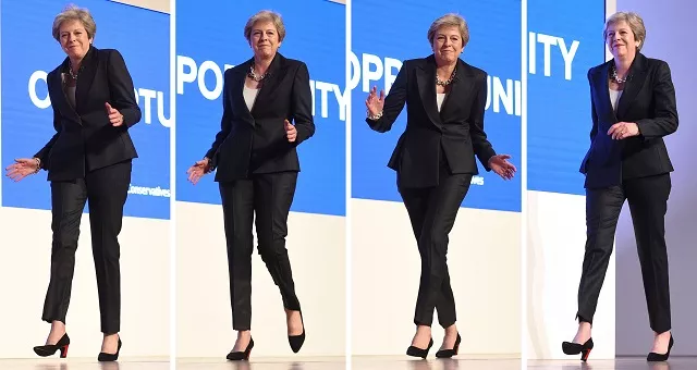 a combination of pictures created on october 3 2018 shows britain 039 s prime minister theresa may dances a few steps as she takes the stage to give her keynote address on the fourth and final day of the conservative party conference 2018 at the international convention centre in birmingham central england on october 3 2018 photo afp a combination of pictures created on october 3 2018 shows britain 039 s prime minister theresa may dances a few steps as she takes the stage to give her keynote address on the fourth and final day of the conservative party conference 2018 at the international convention centre in birmingham central england on october 3 2018 photo afp