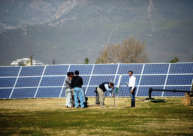 representational image of solar panels being installed photo afp