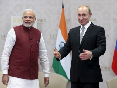 us china look on as putin seeks india arms deals