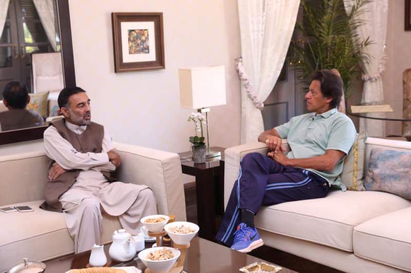 file photo of ig k p salahuddin mehsud in a meeting with pm imran khan photo pti
