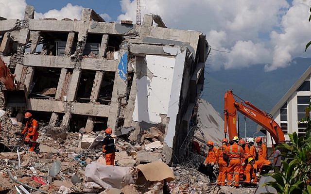 last ditch search for quake survivors as death toll rises photo afp