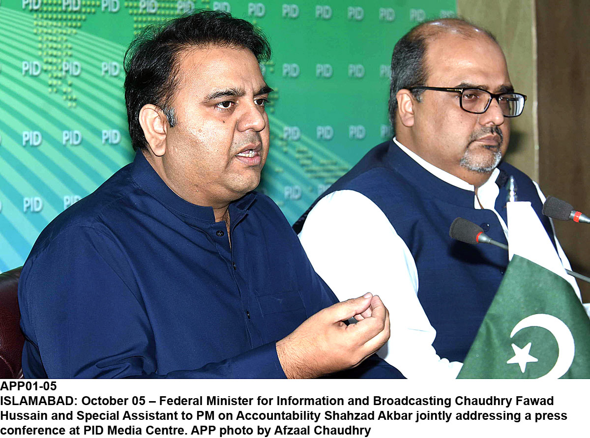 information minister fawad chaudhry and special assistant to pm on accountability shahzad akbar address a press conference photo app